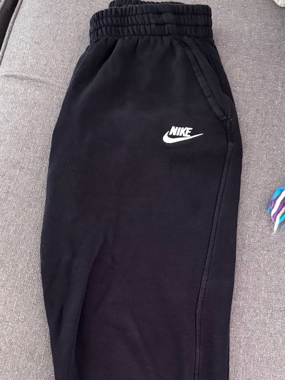 Nike Kids Black Sweatpants with White Swoosh Logo